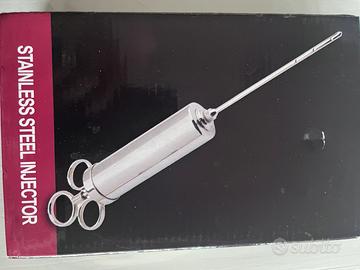 Siringa per marinare carne