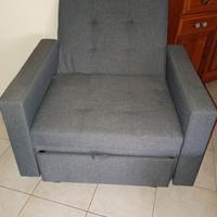 poltrona in tessuto grigio apribile 