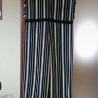 tuta smanicata a righe bianche e nere  