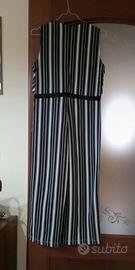 tuta smanicata a righe bianche e nere  