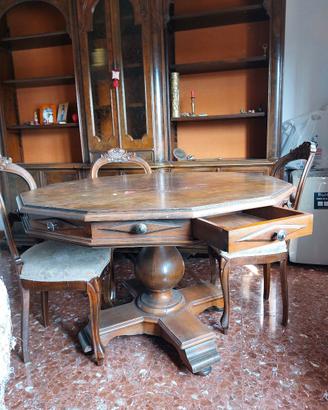 Libreria grande + tavolo rotondo + sedie