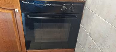 cucina (forno,piano cottura,lavello,rubinetto)