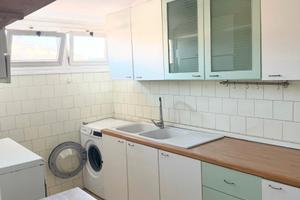 Bilocale con cucina e balcone