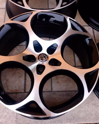 CERCHI 21 ORIGINALI ALFA ROMEO COD:2040