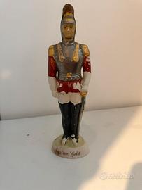 Bottiglia a forma di statuetta