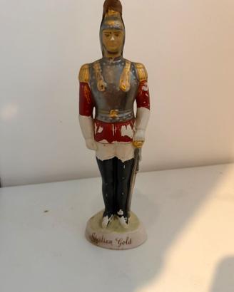 Bottiglia a forma di statuetta