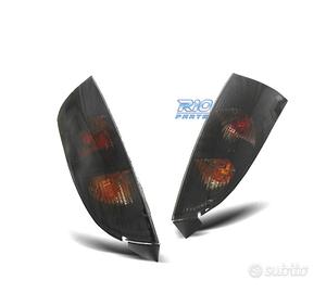 FANALI PER FORD FOCUS MK1 98-04 SFONDO NERO AFFUMI