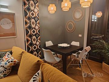 Tavolo Calligaris allungabile + 4 sedie bianche