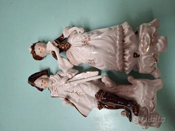 Coppia statuette vintage in porcellana