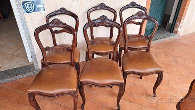 sedie anni 70 in noce e pelle 