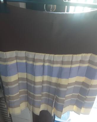 Gonna primavera a pieghe