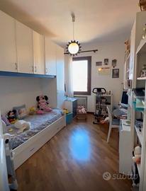 Letto e scrivania per ragazzi