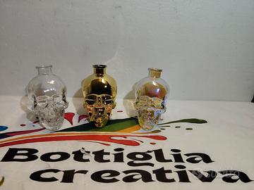 TRIS TESCHI CRISTAL HEAD BOTTIGLIE VUOTE 