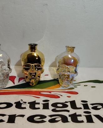 TRIS TESCHI CRISTAL HEAD BOTTIGLIE VUOTE 