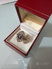 Anello vintage oro e diamanti con zaffiro centrle