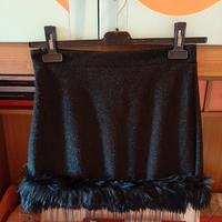Mini gonna nera brillante in lurex