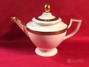 antica teiera in porcellana bianca e oro zecchino