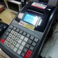 stampante scontrini fiscali e computer  