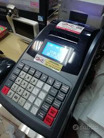 stampante scontrini fiscali e computer  