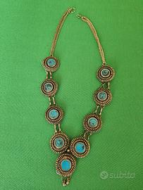 Collana con motivi circolari pietre turchesi onna