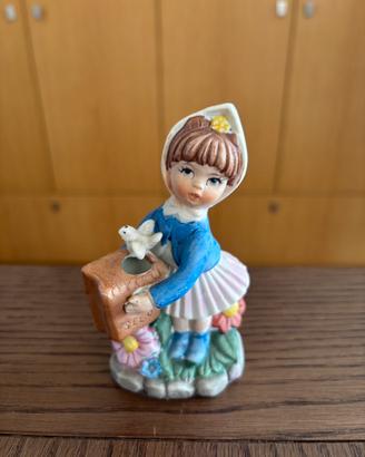 Statuetta vintage ceramica bambina con uccellino