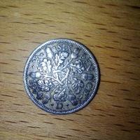 Moneta da 6 pence