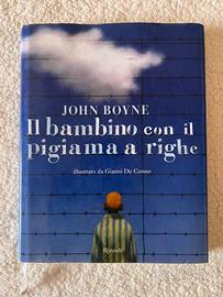 Libri per bambini il bambino con il pigiama a righ