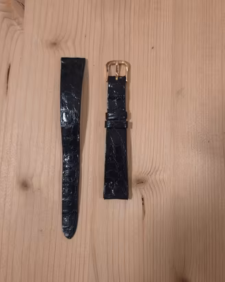 Cinturino in pelle di coccodrillo, danneggiato