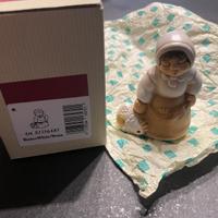 Donna con gallina bianco thun