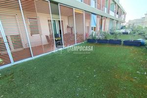 BILOCALE CON TERRAZZO, GIARDINO E POSTO AUTO COPER