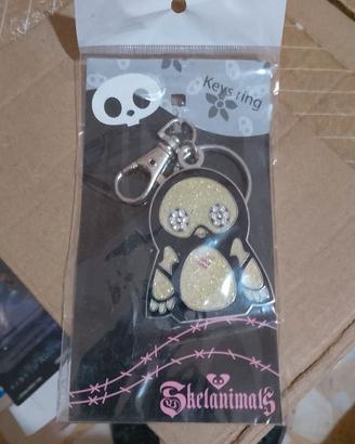 portachiavi in metallo e glitter degli Skelanimals