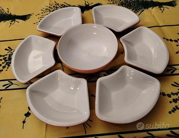 6 piattini più ciotola dedicata. PIRAL.