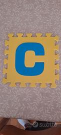 Tappeto puzzle lettere