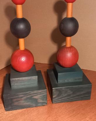sculture legno/ferma libri