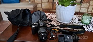 macch. fotogr. Nikon D3100  + trepiedi+custodia
