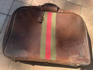 Valigia vintage di pelle marrone
