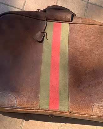 Valigia vintage di pelle marrone