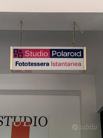 Insegna polaroid