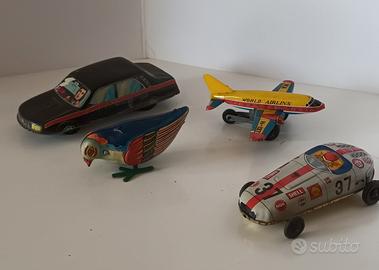 4 giocattoli vintage in latta 