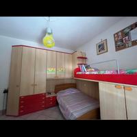 Camera da letto con letto a castello