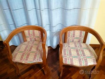 Coppia di sedie vintage in legno imbottite