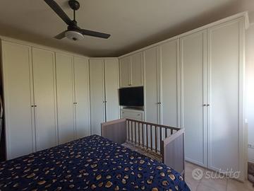 Armadio 10/12 ante camera + comodini