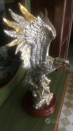 Aquila bagnata in argento