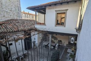 Abitazione più trattoria in centro storico