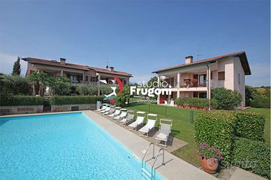 APPARTAMENTO CON VISTA LAGO E DOPPIO POSTO AUTO