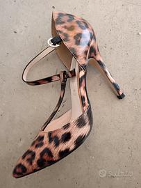 decollete maculate vernice 