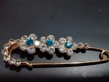 SPILLA gioiello - graffetta azzurra (base oro)