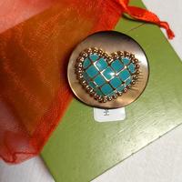 Spilla nuova cuore turchese 