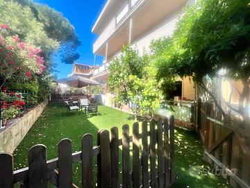 Appartamento con giardino e posto auto privato