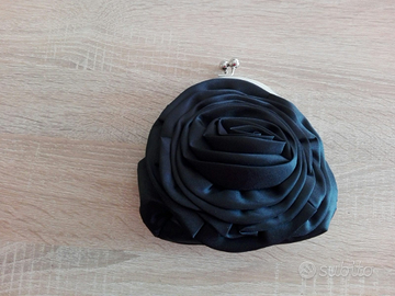 Elegante pochette a mano